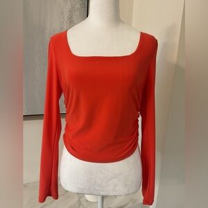 ***NWT ** Olivia Rae Vibrant Orange Long Sleeve Cropped Ruching Top.